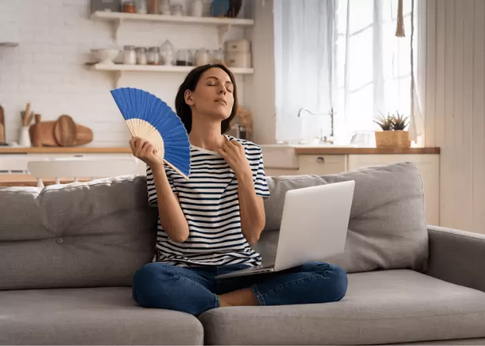 Person too warm indoors due to AC not working